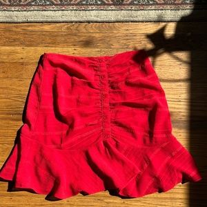 Red button up mini skirt